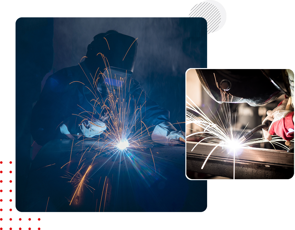 A picture of a person welding with sparks flying.