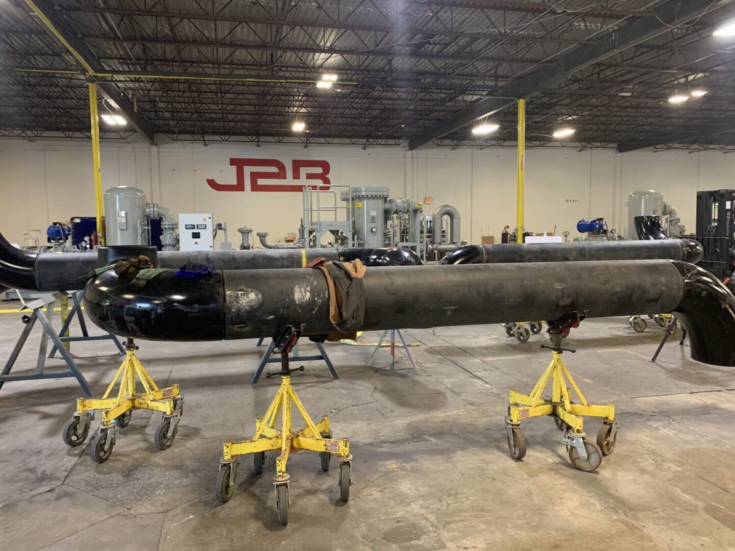 A large pipe sitting in the middle of a room.